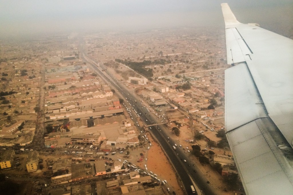 This is Luanda, the capital city of Angola. It's huge and sprawling--like Houston--but the traffic is worse. If you look closely, you'll see lots of white rectangles; these are the pay-by-the-seat taxi-vans that seem to be every other car here.