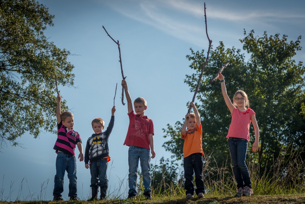 Sticks are awesome. Especially when the littlest kids have the biggest ones. We were very happy at the top of the hill.