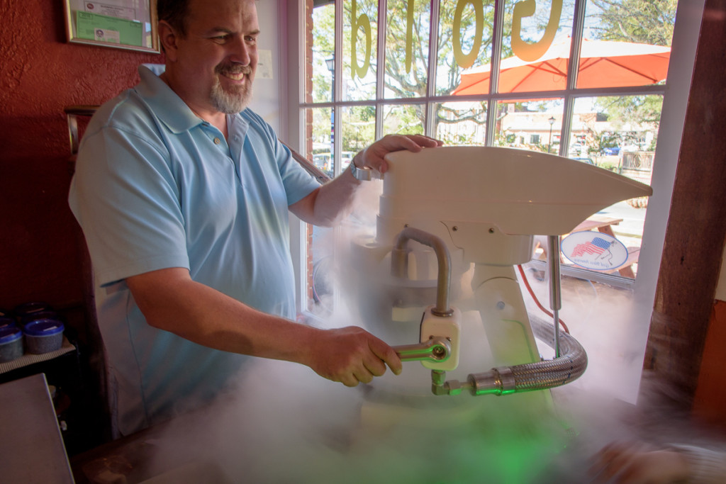 The proprietors at Frozen Gold (right next door to the BBQ joint, of course) take their frozen treats very seriously. Here the owner turns cream, sugar, and strawberries into something tasty.