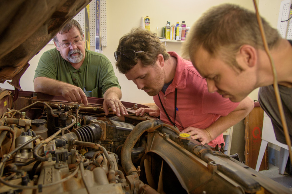 Mike (our instructor) shows John and Erik (ICC classmates) some of the under-the-hood features of our classroom SUV. We went over, under, and in between on that vehicle, learning the in's and out's of the 4WD experience. 